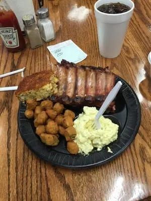 Ribs with tater tots, potato salad and cornbread